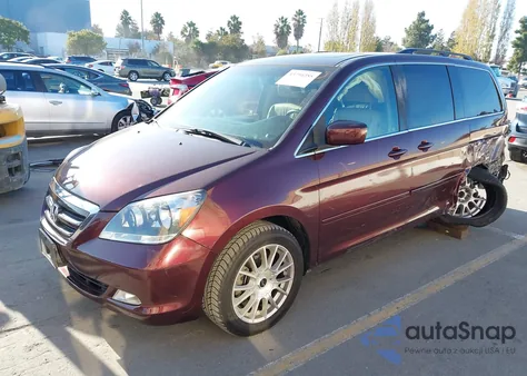 2007 Honda Odyssey Touring z USA, uszkodzony, nr VIN 5FNRL388X7B066836